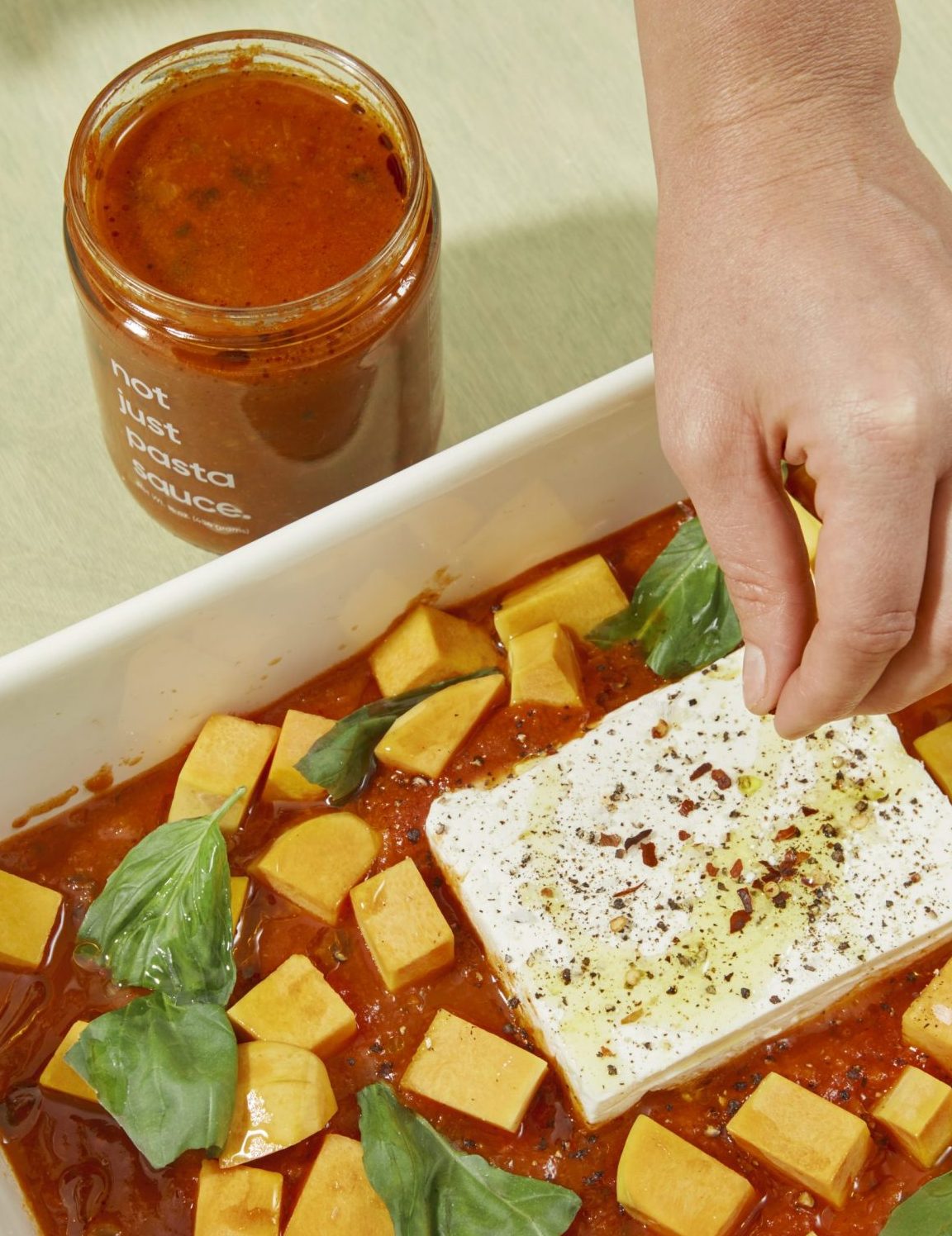 making the baked feta pasta that went viral on tiktok