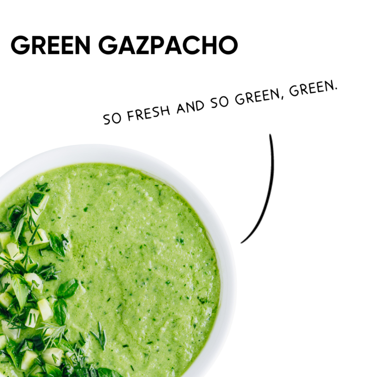 green gazpacho in a bowl on white