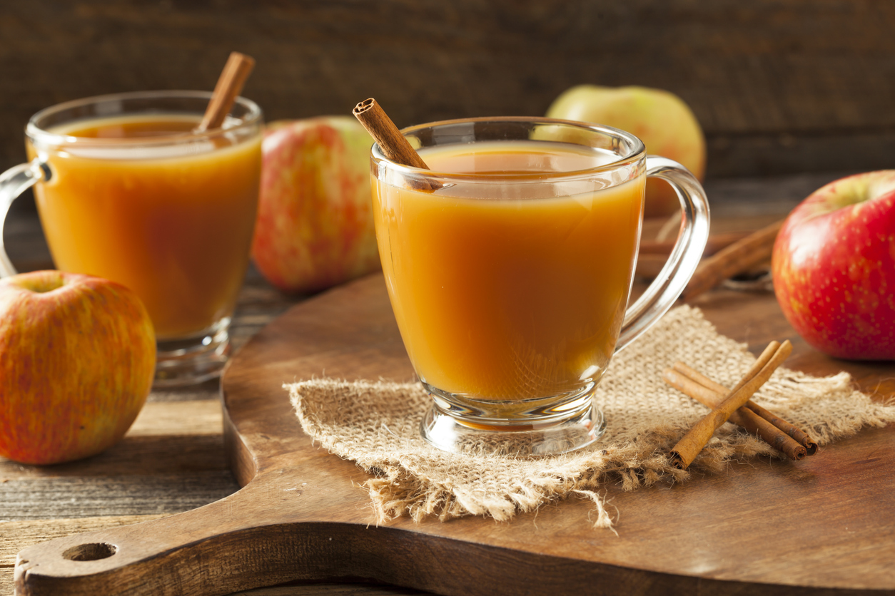 Spiked hot apple cider with cinnamon